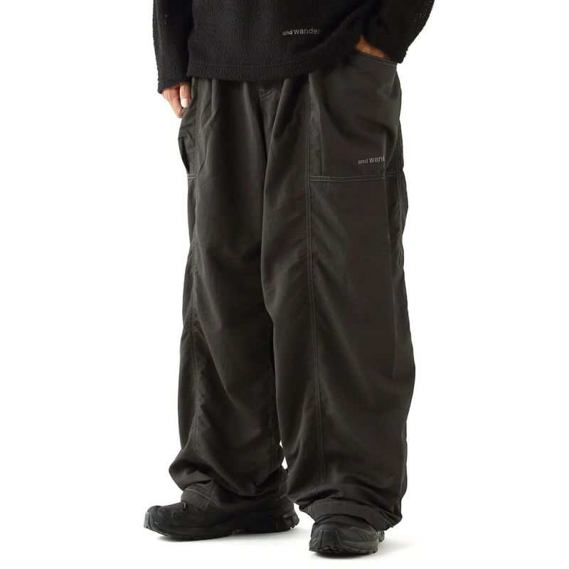 and wander フィッシングパンツ 黒 L AND WANDER（アンドワンダー） オーバーサイズ カーゴパンツ / メンズ